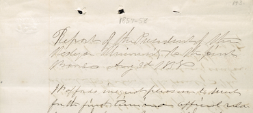Archival photograph of a handwritten report header from 1857, written by the President of Wesleyan University to the Joint Board, featuring elegant 19th-century script.