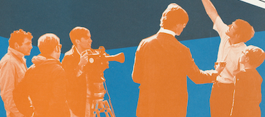 A stylized orange and blue duotone graphic depicting a vintage film crew operating a camera on a tripod and looking upward.