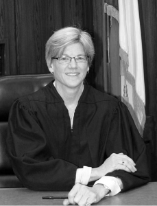 Portrait of Marica Helen Morey in her judges robes.