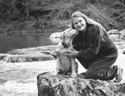 Photo of Margaret Nygard and a dog.