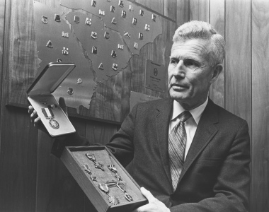 Portrait of Dan Edwards with medals.