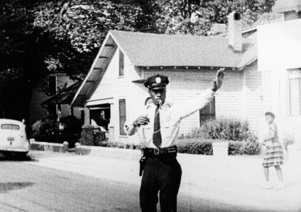 An African-American Durham Police Officer.