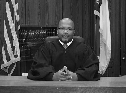 Portrait of Brian C. Wilkes in judges robes.