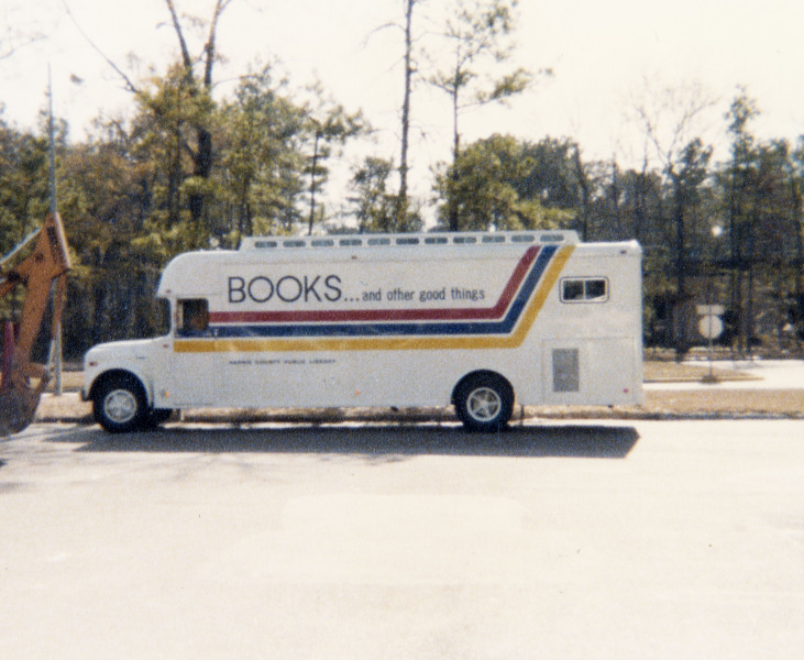 Color photo of the HCPL Bookmobile with the message "Books ... and other good things."