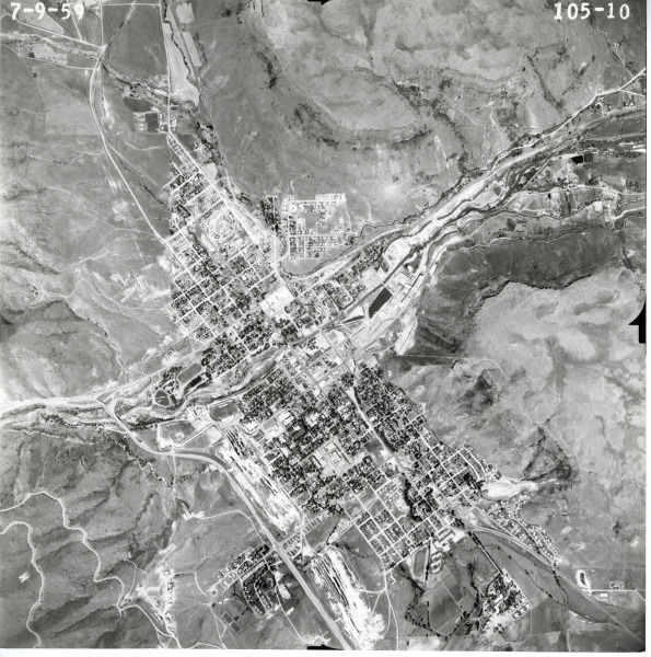 Aerial photograph of Golden, Colorado, showing Clear Creek,  US Hwy 6, W. 44th Ave., Coors Brewery, second Jefferson County Courthouse, Colorado School of Mines, Rubey Clay Mine and parts of both North and South Table Mountains.