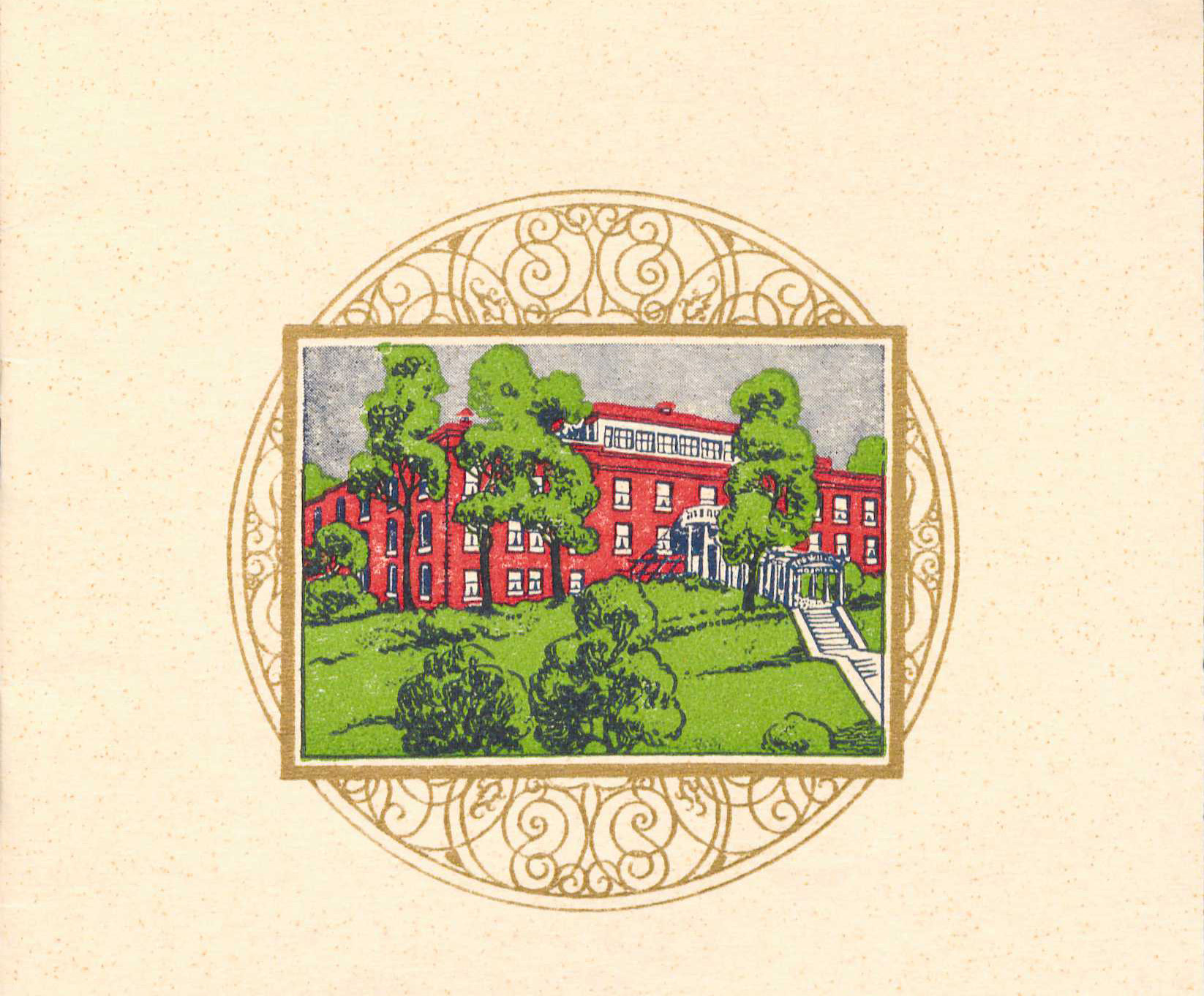 A red brick building on top of a small hill with stairs leading up to the entrance.