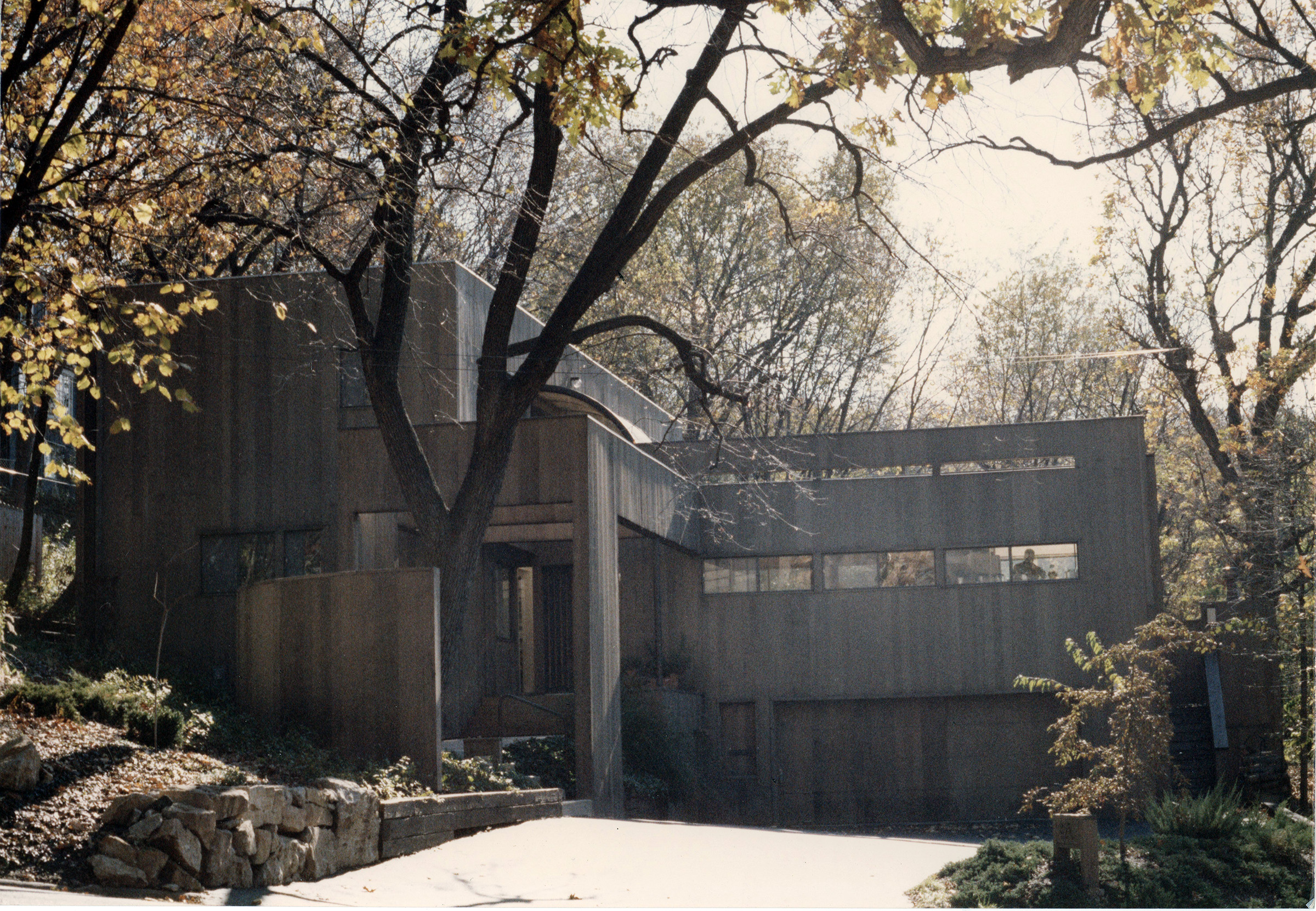 Exterior of a gray house with a modern design.