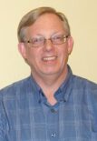 Photographic headshot of Wayne Homren.