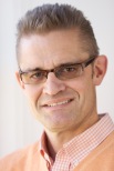 Photographic headshot of David Hill.