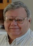 Photographic headshot of Roger Burdette.