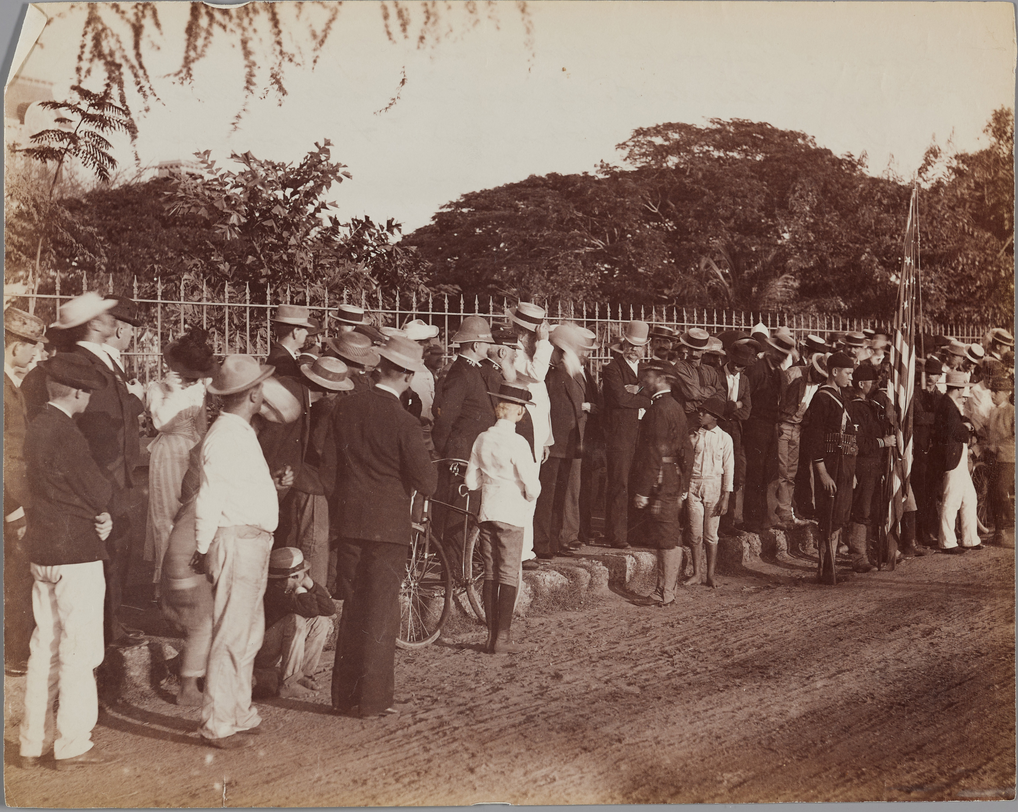 Photograph of Boston Troops being received by Admiral Skerret and a crowd of people.