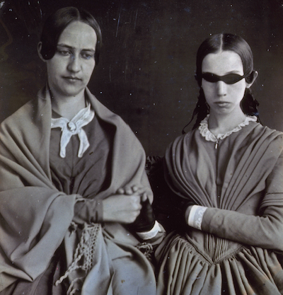 Daguerreotype portrait of Perkins student Laura Bridgman and Sarah Wight circa 1845.