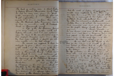 Image of open church register with handwritten pages.