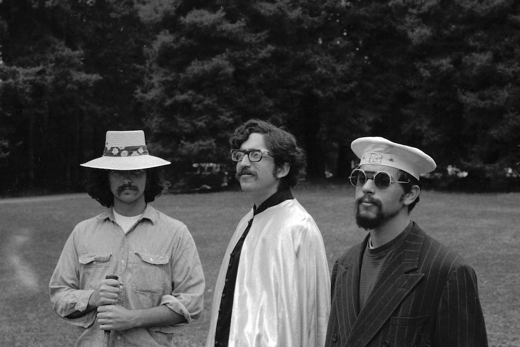 Black & white photo of graduation students in funny hats
