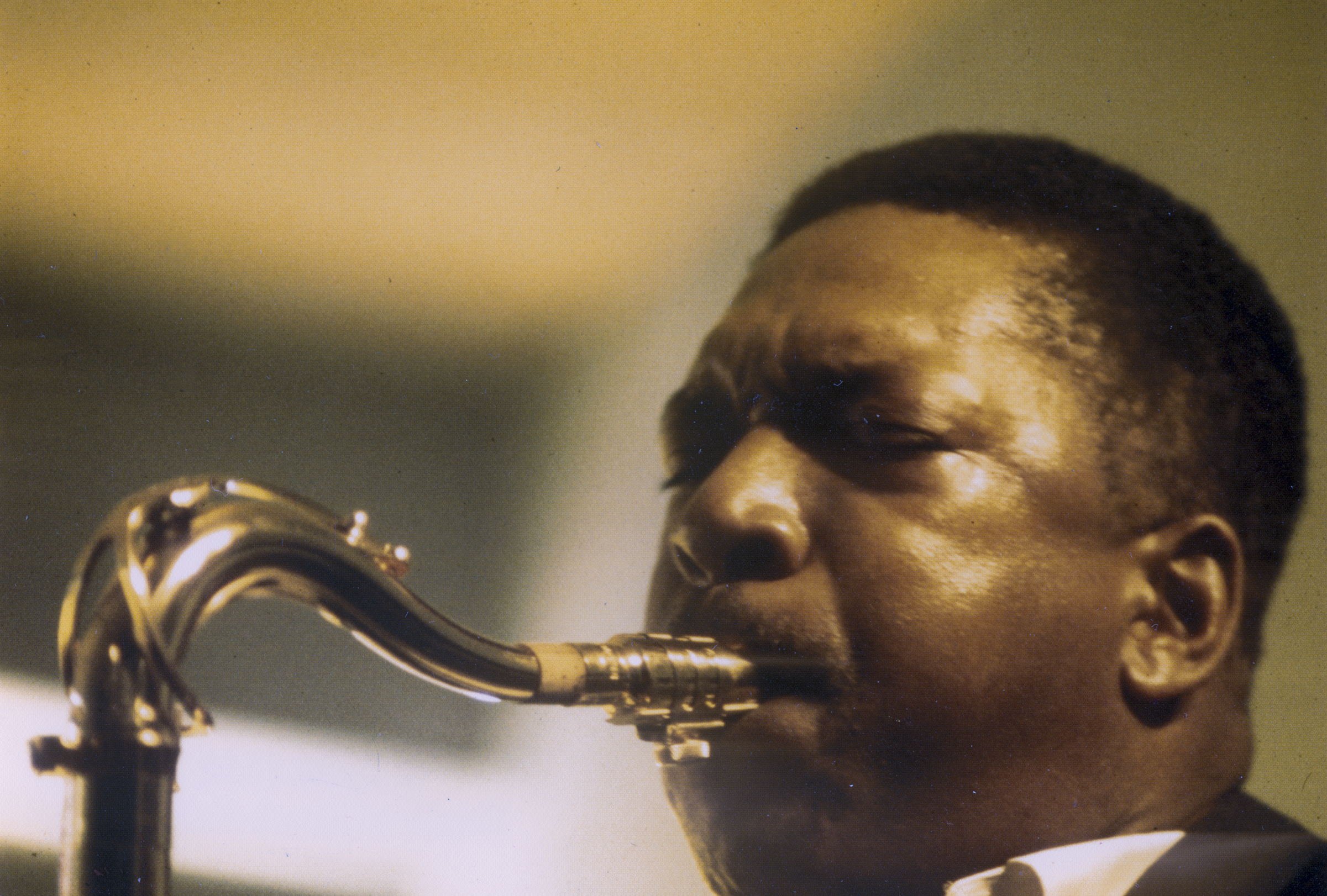 John Coltrane playing saxophone at the Village Theater in 1966
